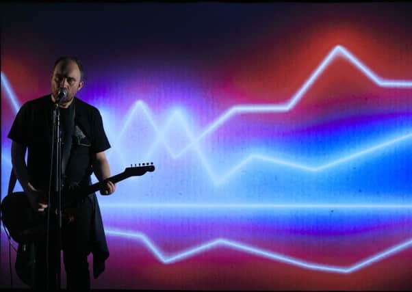 Chris Thorpe uses a well-amplified guitar to blast out his anger with contemporary life. Picture: Contributed