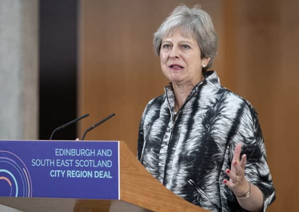 Theresa May's immigration policies were based on hate-filled, anti-immigrant propaganda published by some sections of the media (Picture: Jane Barlow/PA)