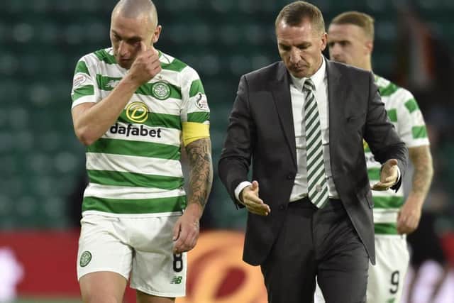 Scott Brown and Brendan Rodgers in discussion at full time. Picture: Rob Casey/SNS