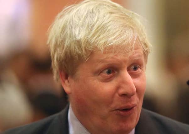 Johnson may cultivate an image of a carefree scamp full of jolly japes, but his embrace of far-right is sinister (Picture: Jonathan Brady/Getty)