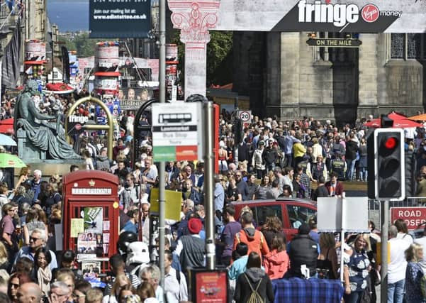Parts of the Old Town are said to have to become too unpleasant in August because of the volume of pedestrians and traffic. Picture: TSPL