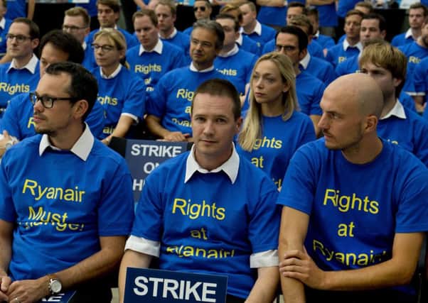 Ryanair pilots dress accordingly as they take part in a meeting during a strike for higher wages in Frankfurt. Picture: AP