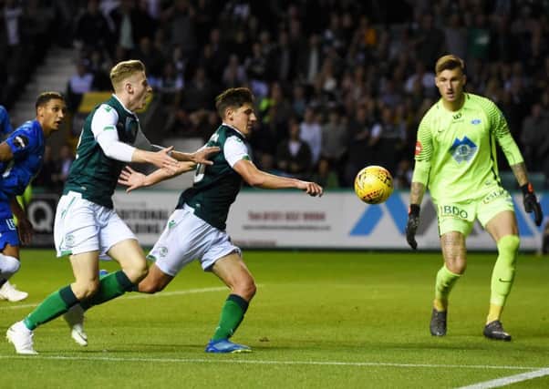 Hibernian's Emerson Hyndman watches as the ball goes wide after his initial effort was blocked in stoppage time. Picture: SNS