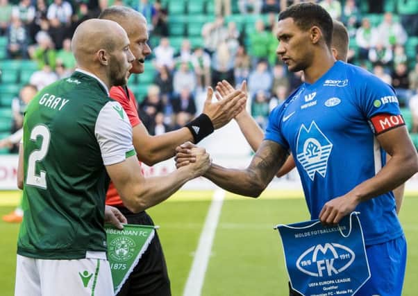 Captains David Gray and Ruben Gabrielsen shake hands ahead of kick off. Picture: SNS Group