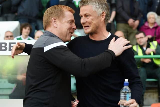 Hibs manager Neil Lennon with Molde manager Ole Gunnar Solskjaer. Picture: Craig Foy/SNS