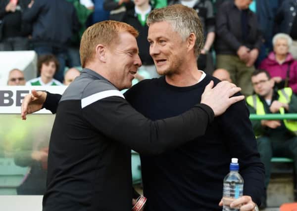 Hibs manager Neil Lennon with Molde manager Ole Gunnar Solskjaer. Picture: Craig Foy/SNS