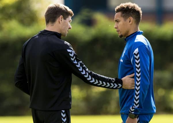 Rangers manager Steven Gerrard speaks to captain James Tavernier who was subject of a bid from West Brom. Picture: SNS/Alan Harvey