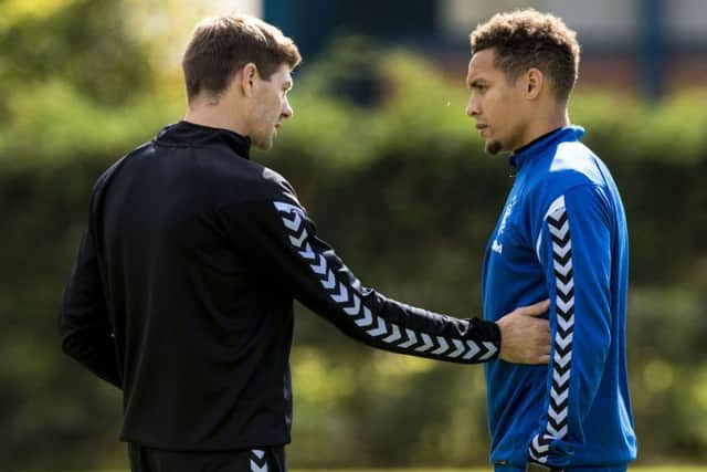 Rangers manager Steven Gerrard speaks to captain James Tavernier who was subject of a bid from West Brom. Picture: SNS/Alan Harvey