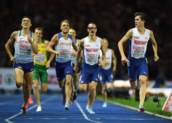 Jakob Ingebrigsten of Norway looks along the line to Jake Wightman of Great Britain as he beats the Scot to win gold in the 1500m final. Wightman won bronze. Picture: Matthias Hangst/Getty Images