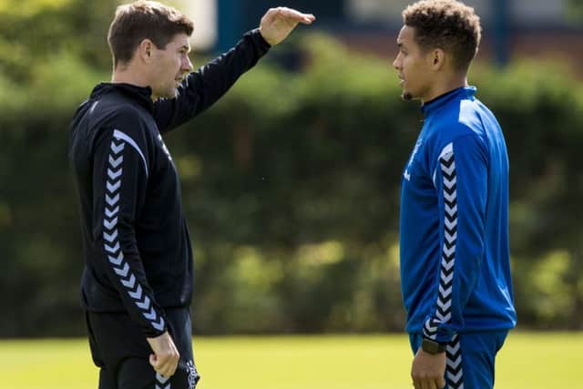 Rangers boss Steven Gerrard chats with captain James Tavernier ahead of tomorrows Premiership clash with 
St Mirren. Picture: SNS.