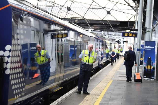 North of the border, Network Rail is funded by Transport Scotland but is ultimately accountable to Westminster. Picture: John Devlin