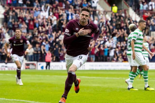 Hearts' Kyle Lafferty celebrates making it 1-0. Pic: SNS/Ross Parker