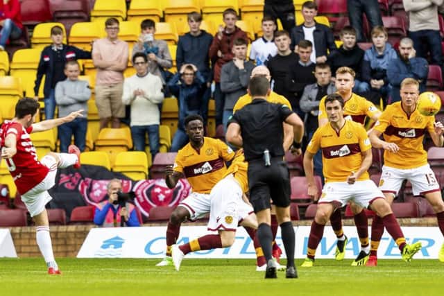 Hamiltons Steven Boyd scores against Motherwell. Pic: SNS/Roddy Scott