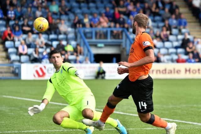 Dundee Uniteds Pavol Safranko scores to make it 2-0  his first goal for the club. Photograph: Craig Foy/SNS