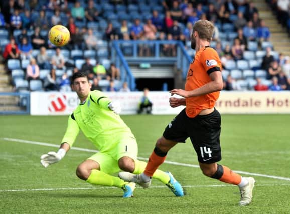 Dundee Uniteds Pavol Safranko scores to make it 2-0  his first goal for the club. Photograph: Craig Foy/SNS
