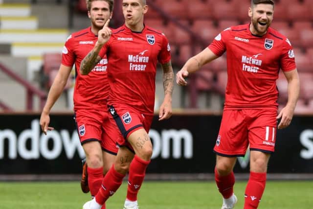 Ross County's Josh Mullin celebrates his opening goal. Picture: SNS
