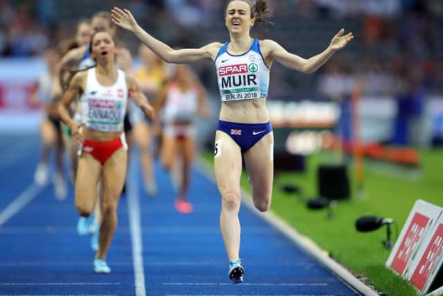 Laura Muir celebrates as she crosses the line to win the gold medal in the Women's 1,500m final. Picture: Getty