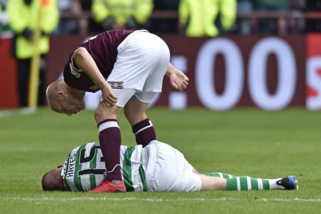 Steven Naismith shouts at Jonny Hayes in the aftermath of the incident. Picture: SNS Group