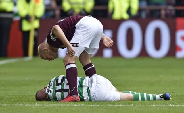 Steven Naismith shouts at Jonny Hayes in the aftermath of the incident. Picture: SNS Group