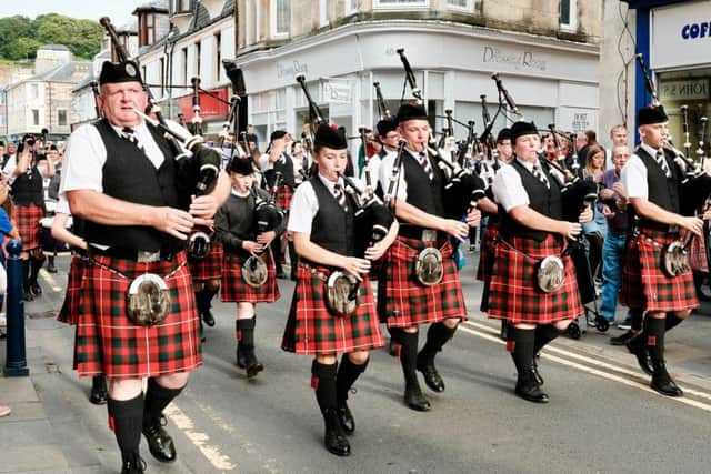 The Rothesay and District Pipe Band march through the town for the Highaldn Games. Photo by Iain Cochrane.
