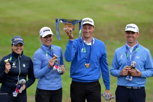The Iceland team of, left to right, Valdis Thora Jonsdottir, Birgir Hafthorsson, Olafia Kristinsdottir and Axel Boasson with their trophy and gold medals after winning the mixed event at Gleneagles last Saturday. Picture: Getty.