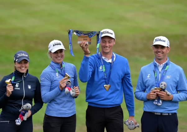 The Iceland team of, left to right, Valdis Thora Jonsdottir, Birgir Hafthorsson, Olafia Kristinsdottir and Axel Boasson with their trophy and gold medals after winning the mixed event at Gleneagles last Saturday. Picture: Getty.
