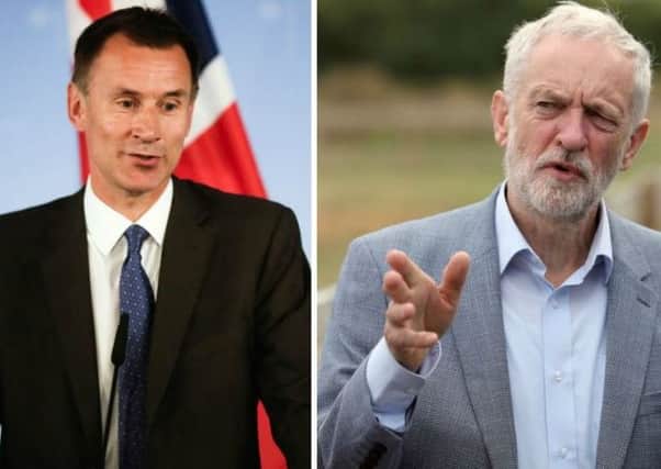 Foreign Secretary Jeremy Hunt (L) has racheted up pressure on Labour leader Jeremy Corbyn (R). Picture: PA Wire