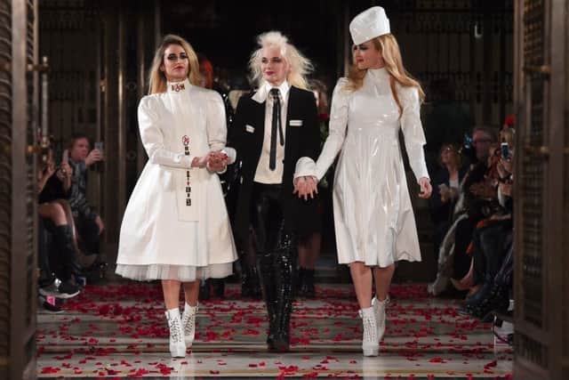Pam Hogg flanked by models Alice Dellal and Fearne Cotton on the runway after her London Fashion Week show, February 2017. Picture: Eamonn M McCormack/Getty Images