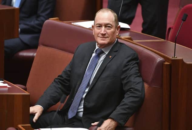 Australian senator Fraser Anning sits in the chamber during a session at Parliament House in Canberra. Picture: Mick Tsikas/AAP Image via AP