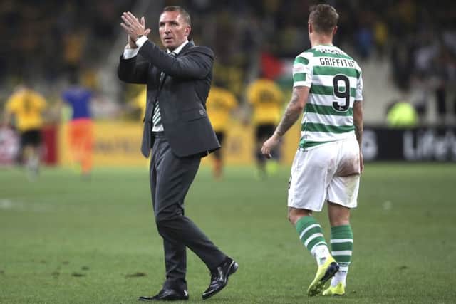 Brendan Rodgers applauds the Celtic fans after his side failed to advance past AEK Athens in Europa League qualifying. Picture: AP