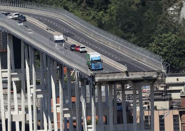 At least 38 people were killed when the giant motorway bridge collapsed in Genoa in northwestern Italy. Picture: AFP/Getty Images