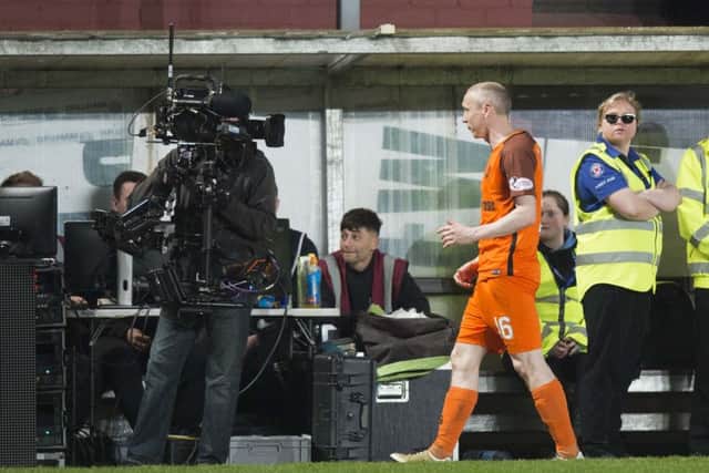 Dundee United's Willo Flood had words for the BT Sport cameras. Picture: SNS/Ross Parker