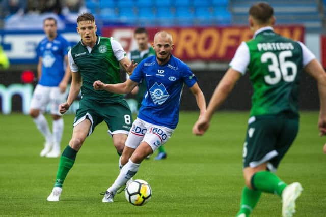 Eirik Hestad shields the ball from Vykintas Slivka at the Aker Stadion. Picture: Svein Ove Ekornesvaag/Scanpix/AP