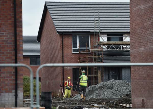 Building sector growth was cut from 34 per cent to 6 per cent. Picture: Jeff J Mitchell/Getty