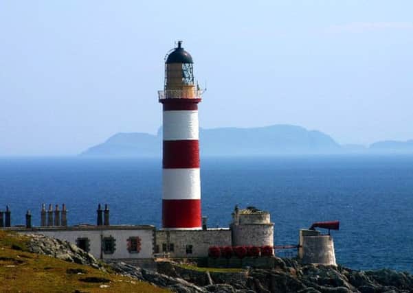 The original 18th Century Eilean Glas lighthouse can be seen to the right of Stevenson's famous red and white creation, which was built in the 1820s. PIC: www.geograph.org.uk.