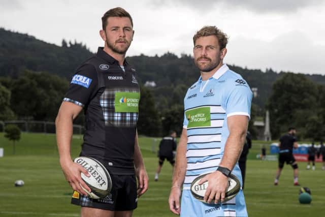 Co-captains Callum Gibbins and Ryan Wilson show off Glasgow Warriors' new strips. Picture: SNS Group