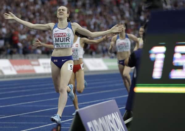 Laura Muir celebrates after winning the 1500m European title in Berlin. Picture: AP