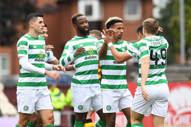 Celtic's Moussa Dembele celebrates his goal with his teammates. Pic: SNS/Craig Foy