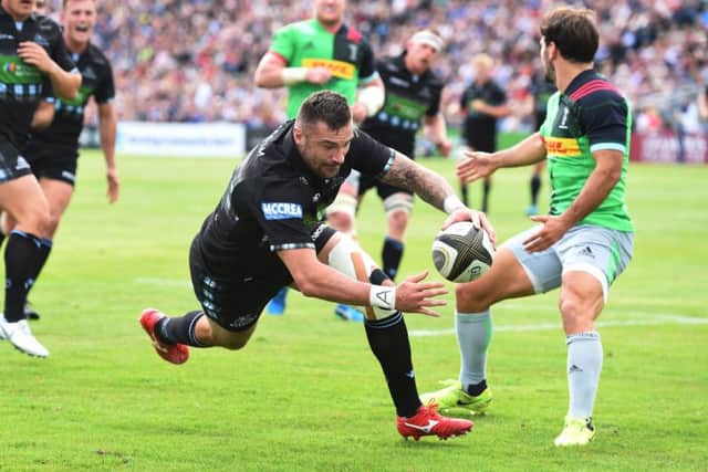 Rory Hughes scores for Glasgow in a one-sided game with a depleted visiting team. Photograph: Gary Hutchison SNS/SRU
