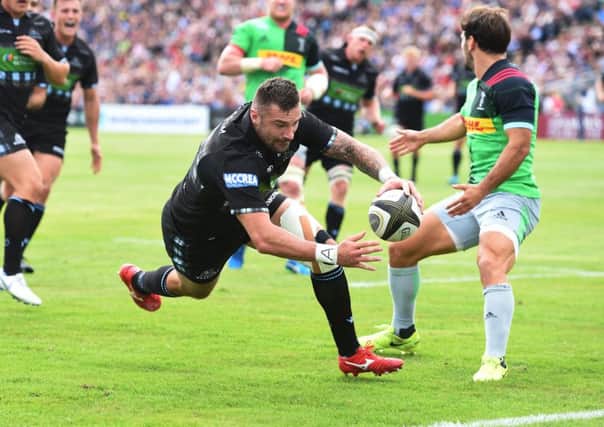 Rory Hughes scores for Glasgow in a one-sided game with a depleted visiting team. Photograph: Gary Hutchison SNS/SRU