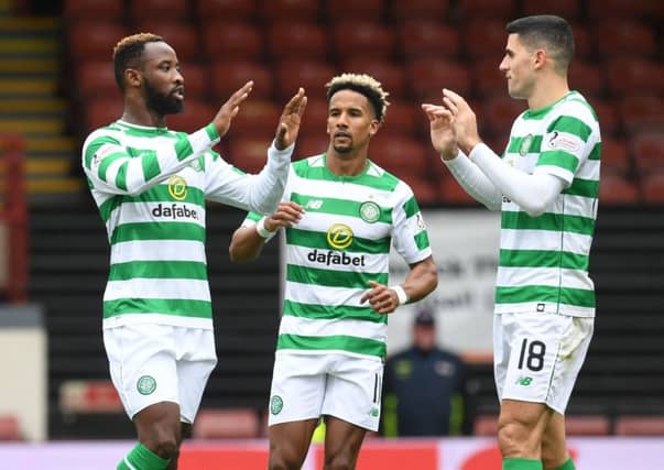 Moussa Dembele, left, wishes to leave Celtic. Picture: SNS