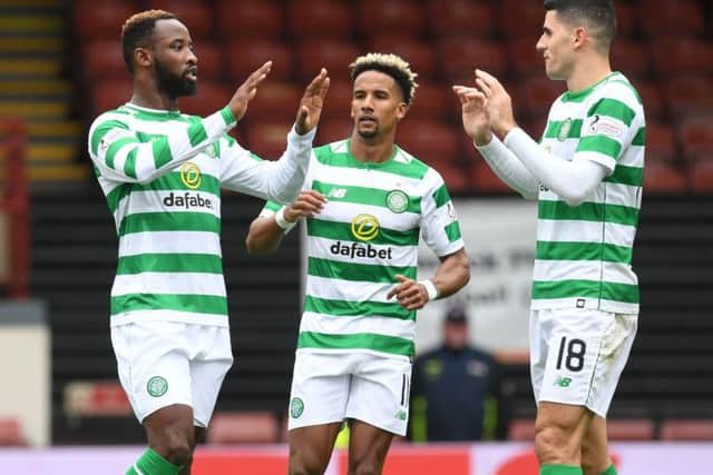 Moussa Dembele, left, wishes to leave Celtic. Picture: SNS