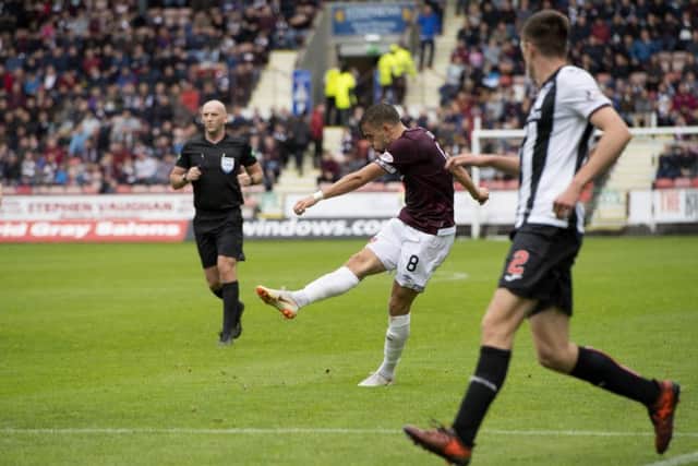 Hearts' Olly Lee goes close with a shot just over the bar. Pic: SNS/Ross Parker