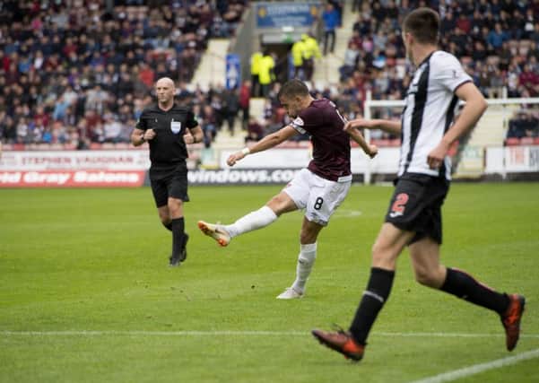 Hearts' Olly Lee goes close with a shot just over the bar. Pic: SNS/Ross Parker