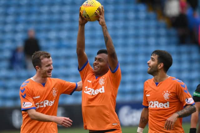 Rangers' Alfredo Morelos with the match ball after his hat-trick performance. Picture: SNS