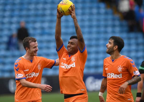 Rangers' Alfredo Morelos with the match ball after his hat-trick performance. Picture: SNS