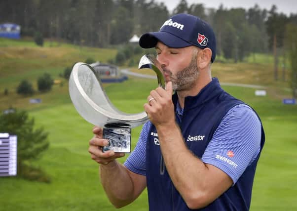 Paul Waring of England kisses the trophy after winning the Nordea Masters at Hills Golf Club. Picture: AP