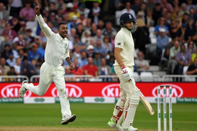 Indias Hardik Pandya celebrates after claiming the wicket of England captain Joe Root on a dramatic second day 
at Trent Bridge. Picture: Getty