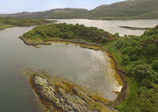 An untouched Scottish island on the west coast has gone on the market for Â£120,000. Picture: SWNS