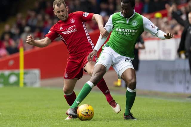 Niall McGinn and Efe Ambrose will meet twice in a month on league and Betfred Cup duty as Aberdeen face two trips to the capital. Picture: SNS Group